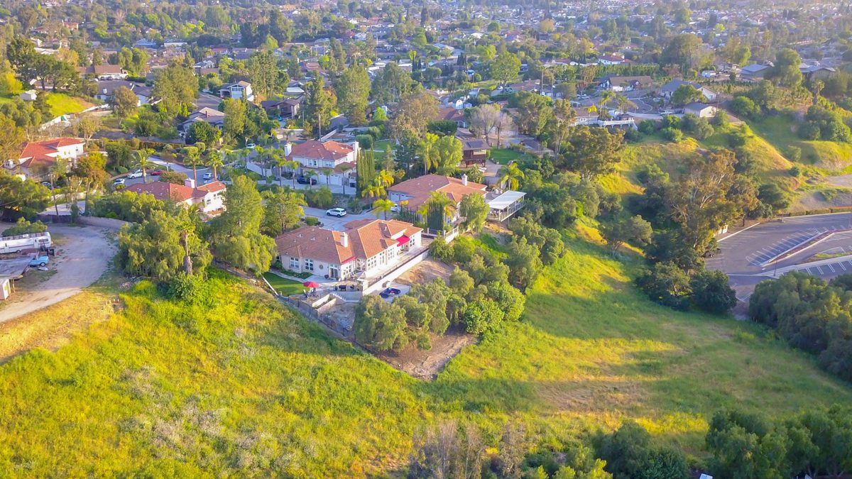 Aerial view of rolling hills and rural properties in Southern California
