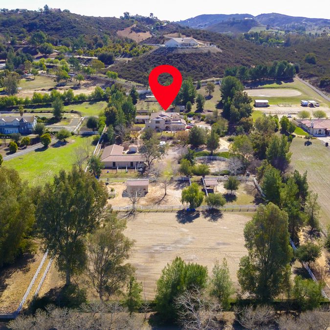 Aerial view of ranch land and equestrian properties in the La Cresta area